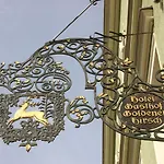& Goldener Hirsch Szálloda